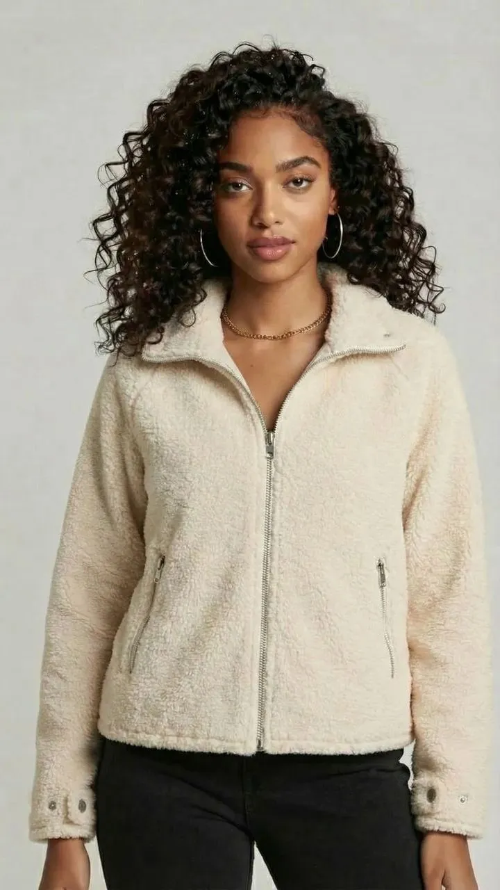 Riverflow 2.0 Pro Edit: Change to a natural, realistic style, the woman depicted in Figure 1 is now wearing the coat from Figure 2 - a